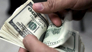 Dólar.